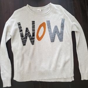 "Wow" sweater with hug slit sides